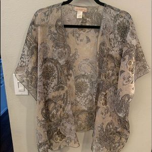 Multi- colored “moth” cardigan.